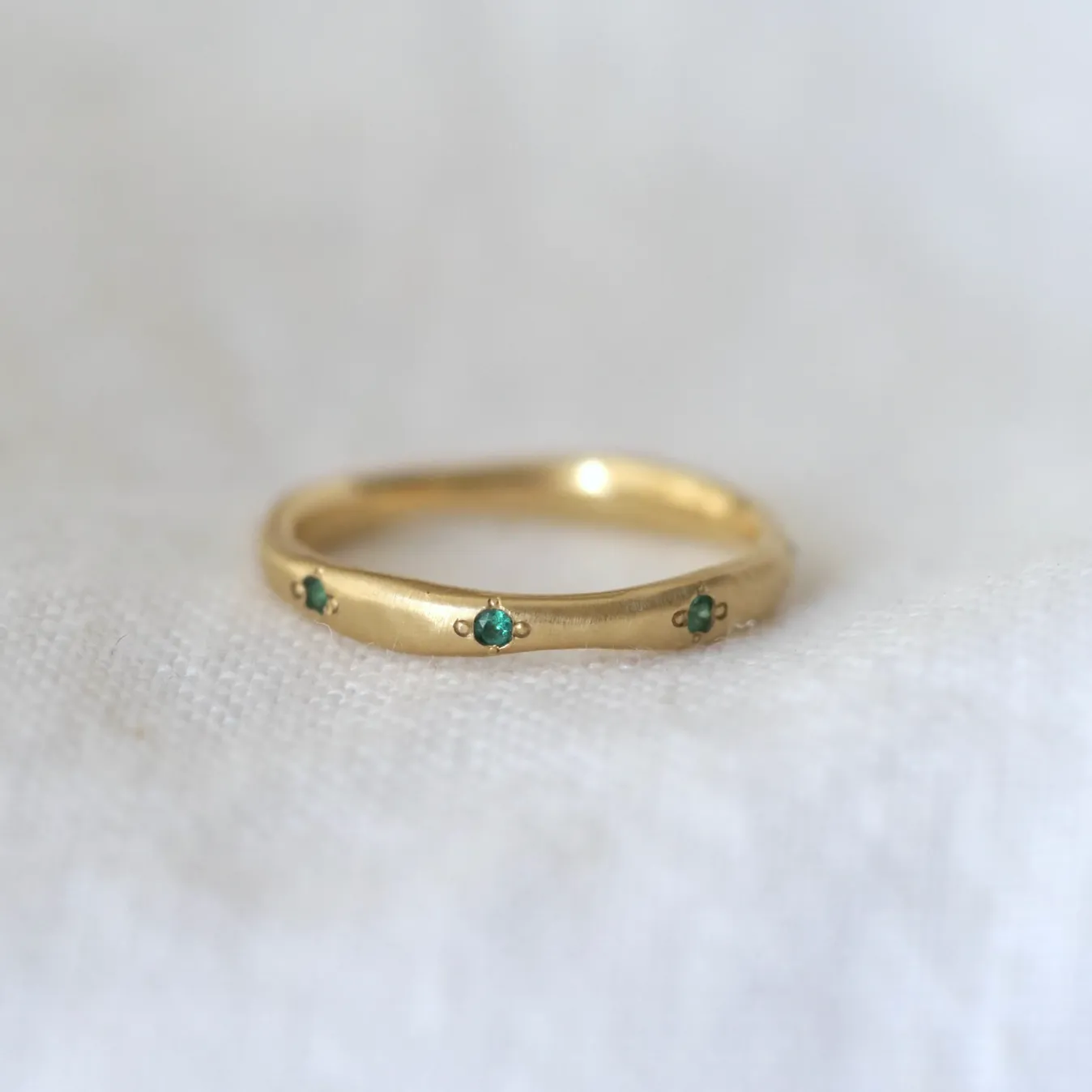 Delicate Wavy Band - Emeralds