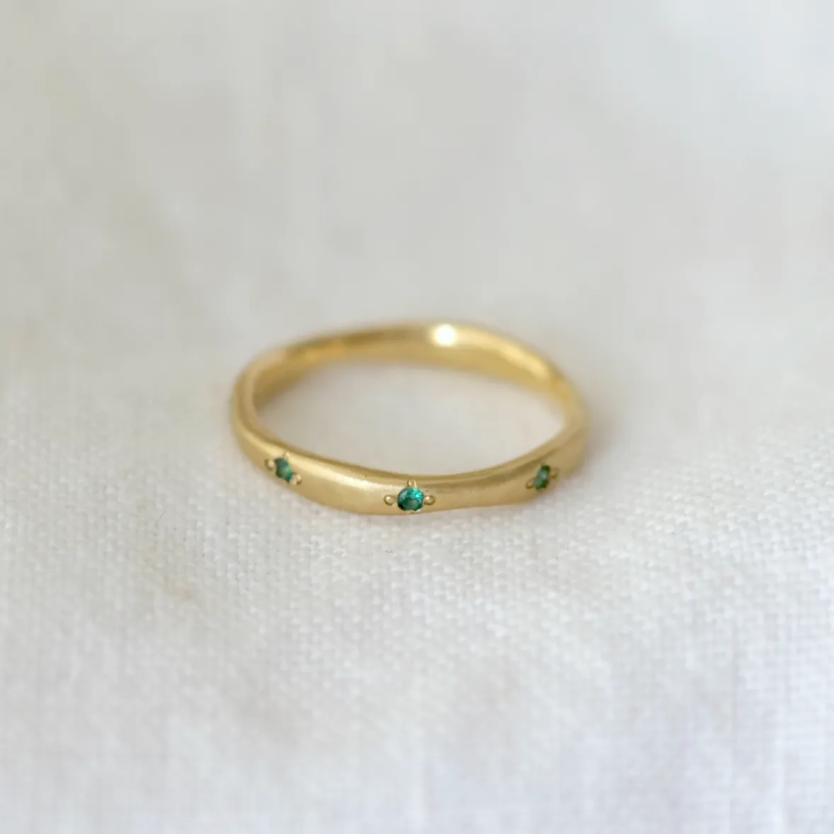 Delicate Wavy Band - Emeralds