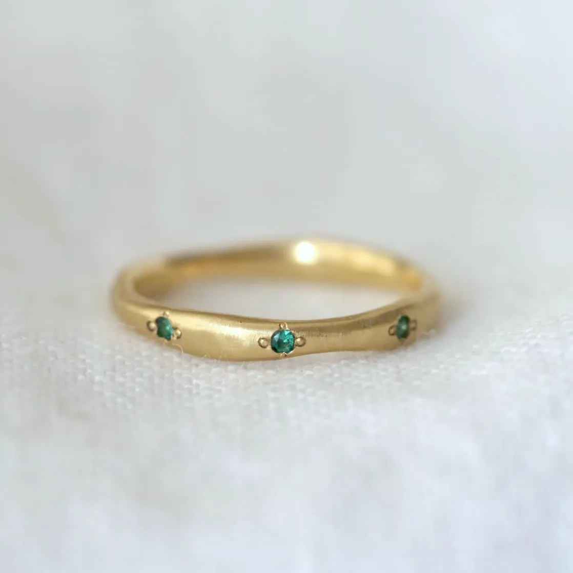 Delicate Wavy Band - Emeralds