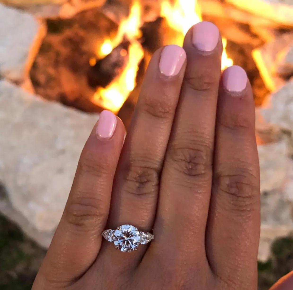 Round with Pear Cut Side Stones